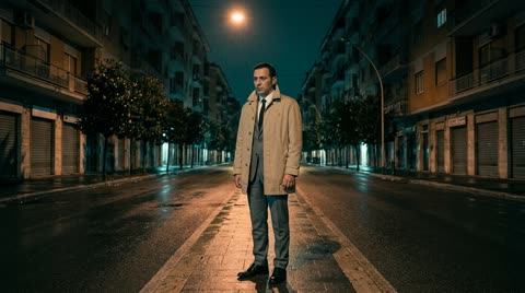 Paolo (the man in the beige raincoat)