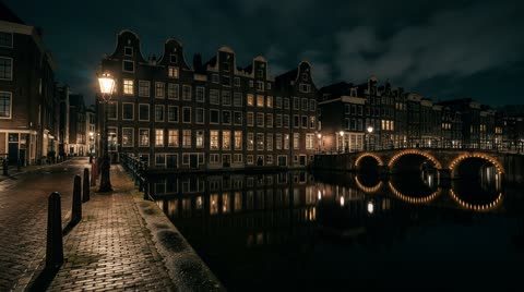 Amsterdam canal quay — night